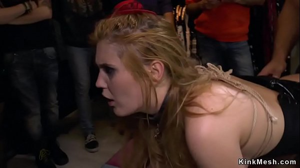 Blonde spanked and caned in public